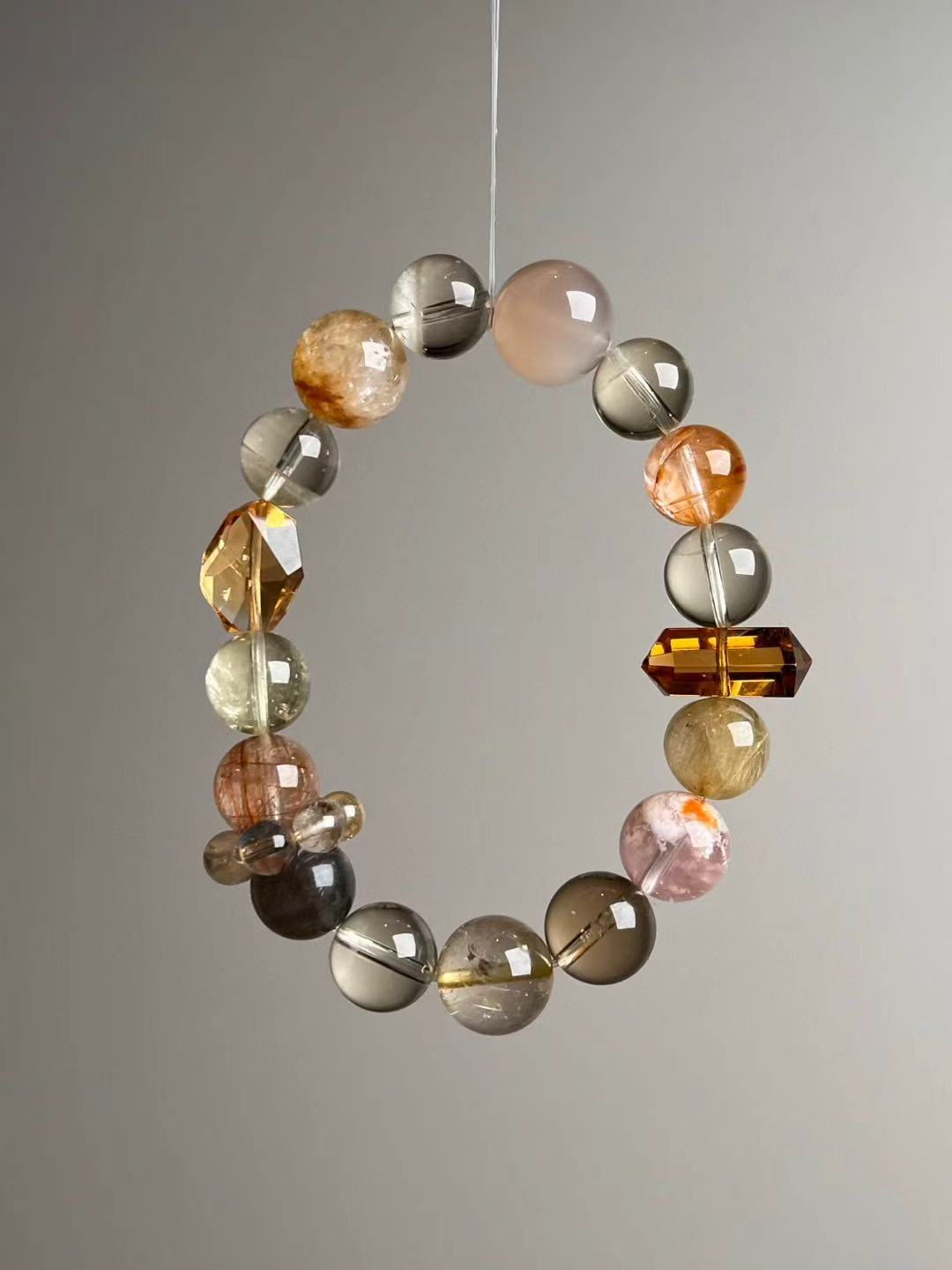 celestial-crystal-golden-wealth-matrix-14-11mm-hero-angle-b