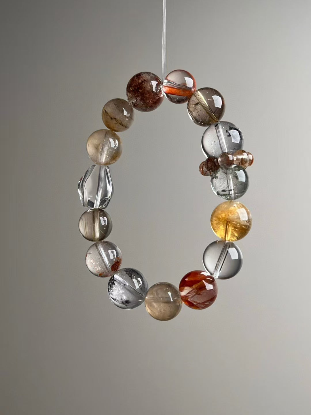 Hero angle D: Red garden quartz ‘flower’ bead with clear quartz highlights