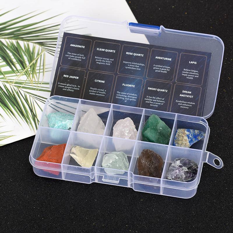Open case on dark backdrop showing labeled lid card and compartments.