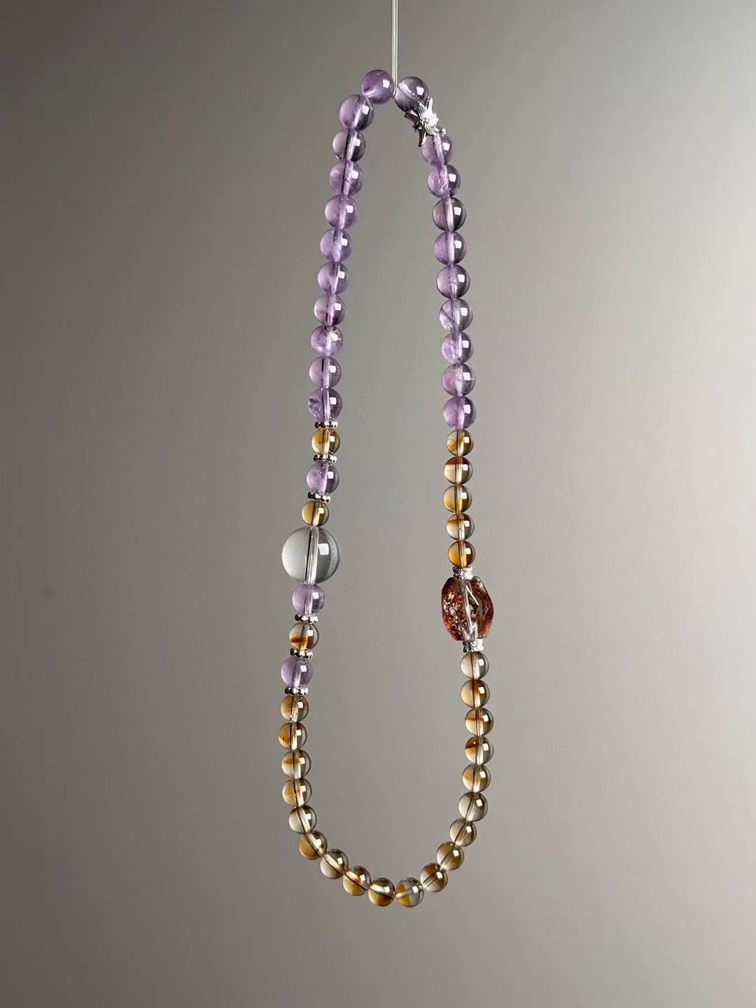 Component close — Amethyst, Citrine tower bead, Clear Quartz and Phantom Quartz details for the double-wrap bracelet
