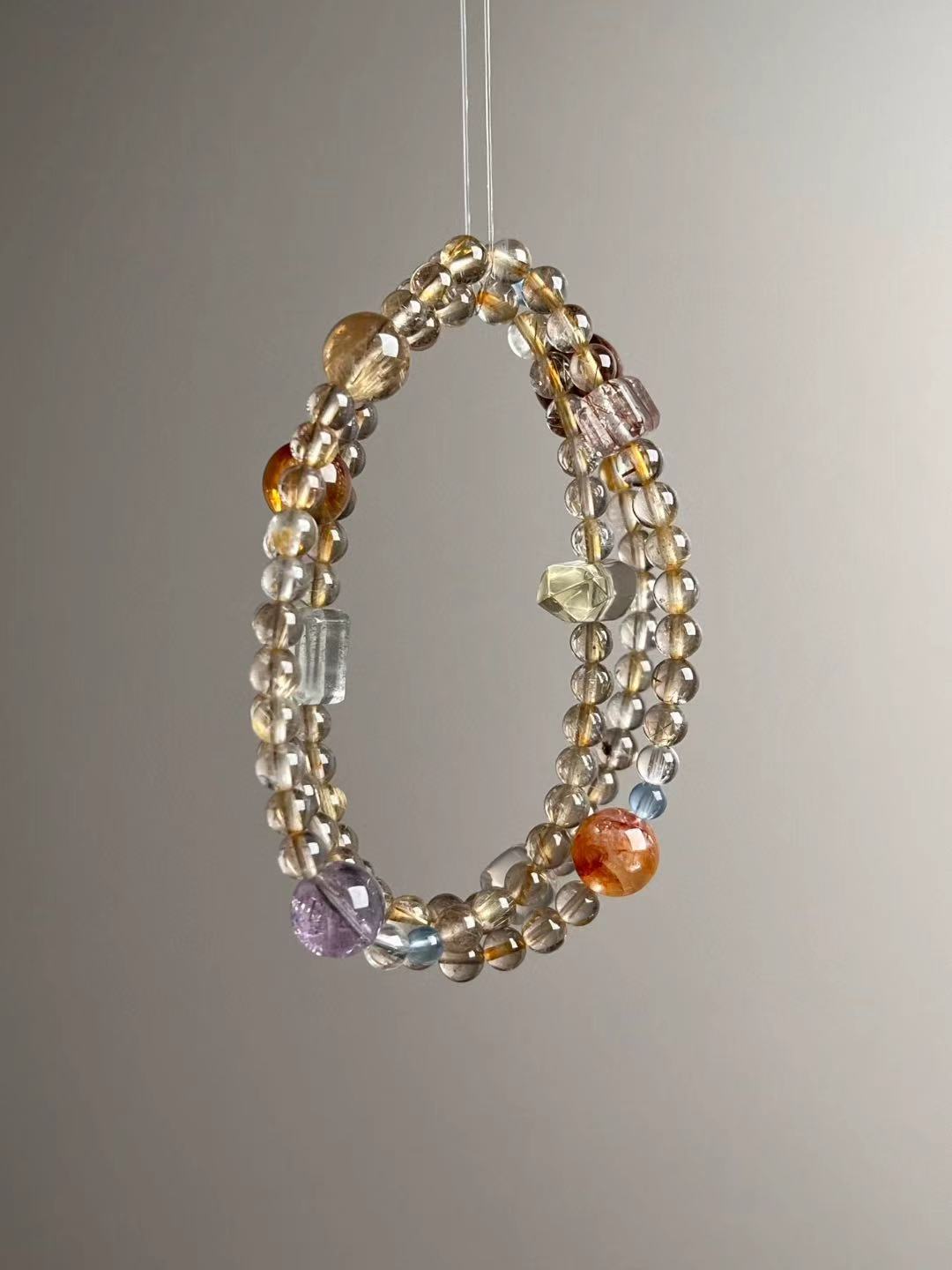 Hero view — Golden Rutile Quartz multi-wrap bracelet with Clear Quartz, Citrine towers and double-terminated point, Aquamarine, Super Seven.