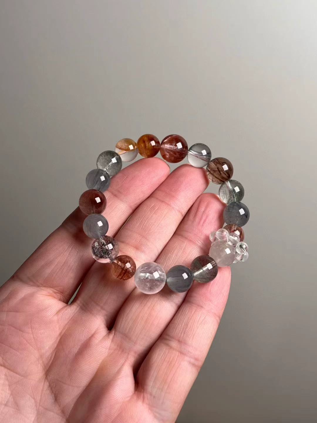 Hero — multi-gem energy bracelet featuring Black Super Seven, Blue Rutilated Quartz, Green & White Phantom Quartz, red/yellow koi flower quartz and gray hair quartz (12–10 mm).
