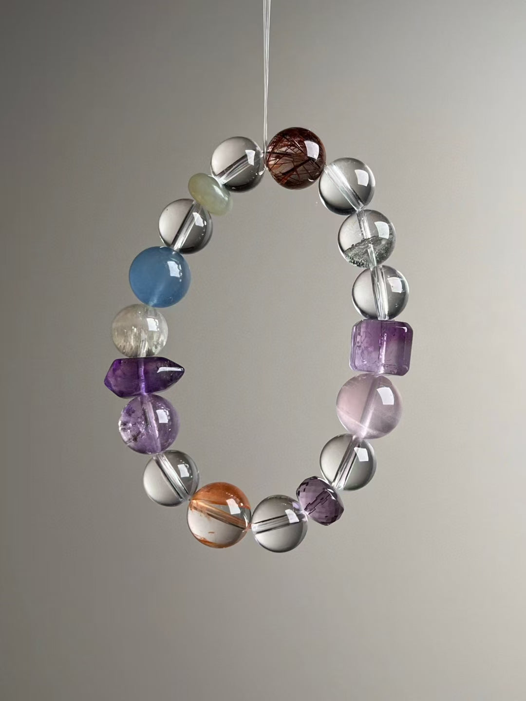 Detail — Aquamarine, Hetian jade safety-donut, Clear Quartz and faceted Amethyst disc