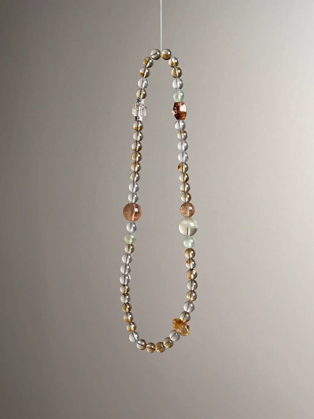 Flat lay — components callout: Citrine tower & DT point, Clear Quartz, rutilated “cube”, Prehnite, Orange & White Phantom, copper rutile.
