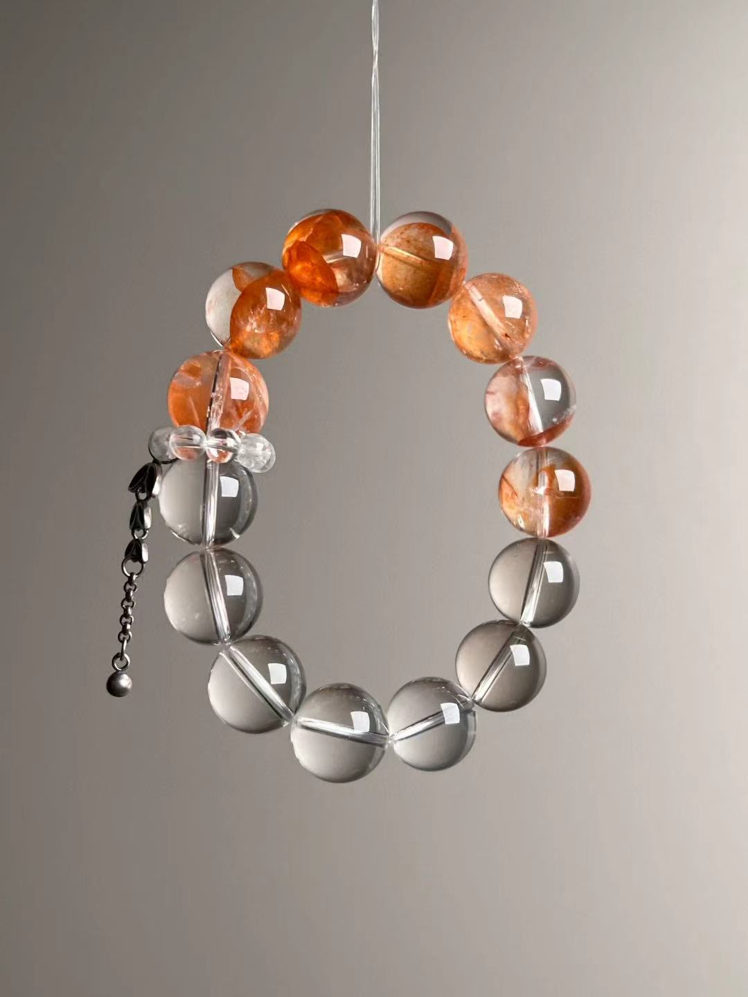 Front hero—Citrus orange Fanta Garden Quartz paired with Clear Quartz; balanced half-and-half design, approx. 11–12 mm