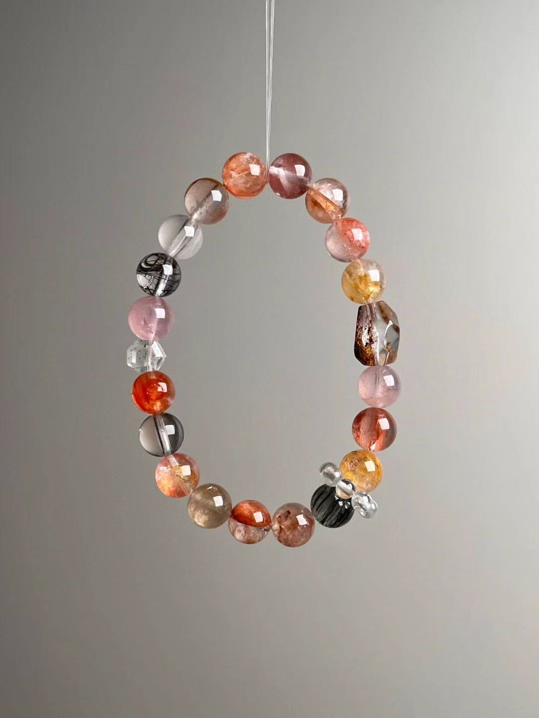 Macro texture—Yellow Phantom Quartz, Rose Quartz, Koi/Red/Yellow Flower resin, Black Rutilated Quartz and Clear Quartz