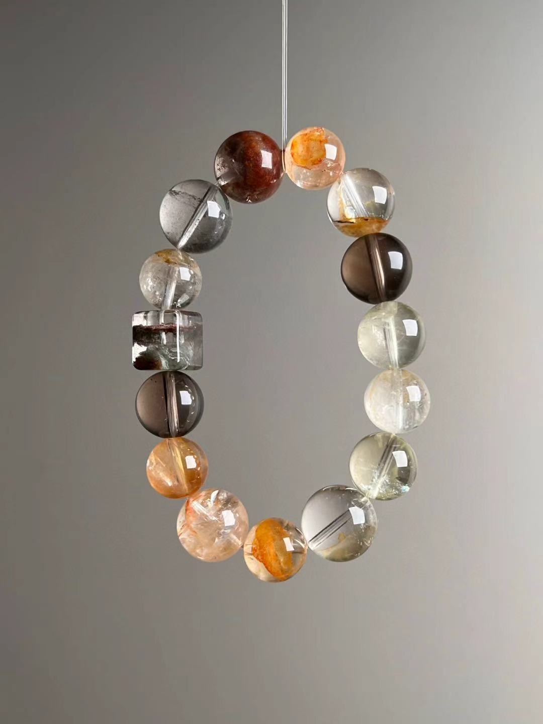 Angled hero—yellow Azeztulite glow and rounded Smoky Quartz with yellow bead-cluster spacer