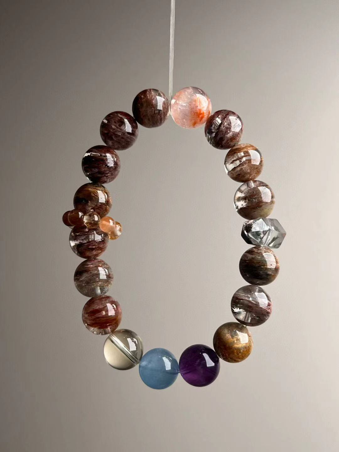 Close view of bead transparency and mixed inclusions—phantom quartz focus