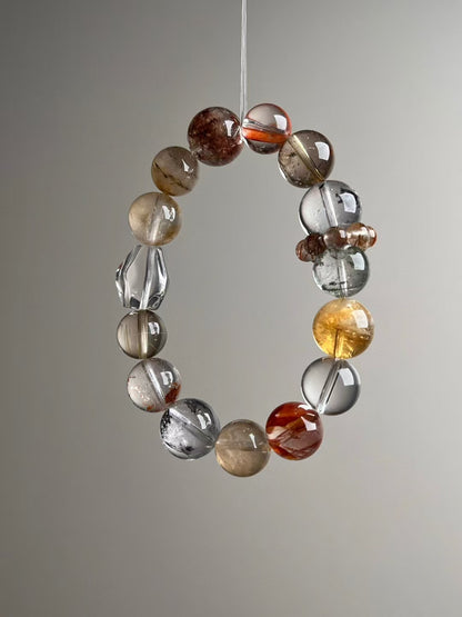 Hero angle D: Red garden quartz ‘flower’ bead with clear quartz highlights