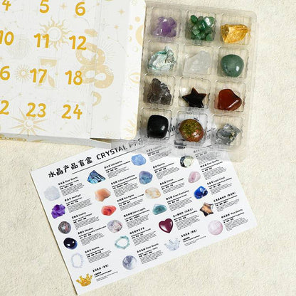 Tray of mixed gemstones beside a bilingual identification card listing stones like clear quartz, amethyst and citrine.