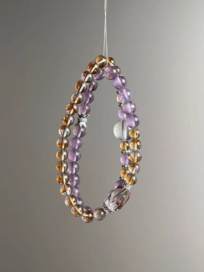 Hanging view — two slim strands with Amethyst and golden Citrine, plus Clear Quartz orb and faceted Phantom Quartz focal.