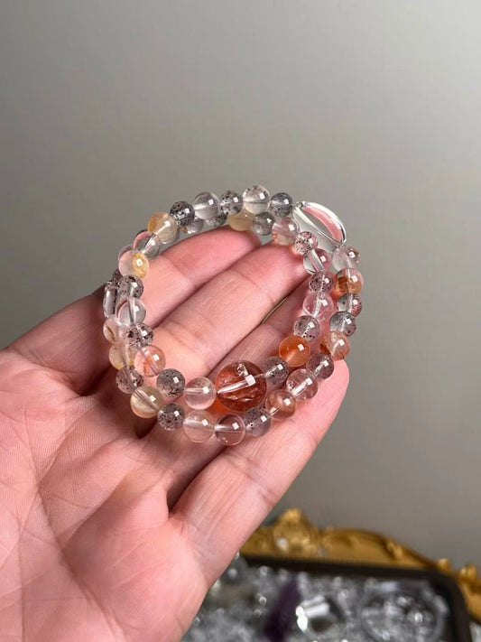 Hero — Black Strawberry Quartz bracelet with Super Seven “Venom” cube, Clear Quartz and red/yellow Garden Quartz rounds (13.5–7 mm).
