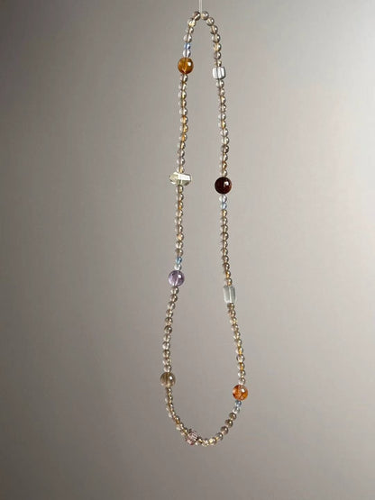 Side angle — Yellow Citrine double-terminated point and Amethyst round accent visible.