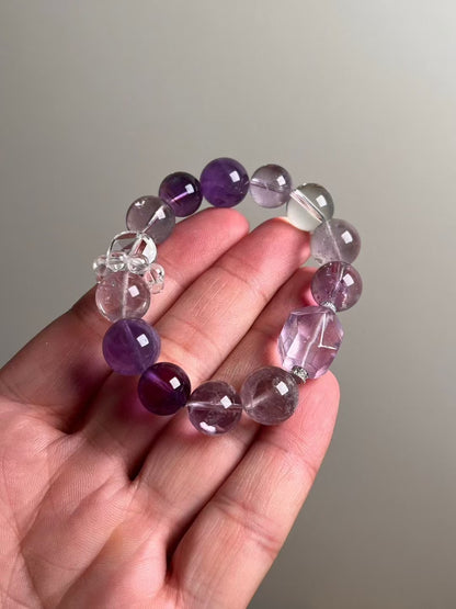 Hero — Amethyst and Clear Quartz bracelet with Purple Azeztulite centerpiece and clear-quartz runner cluster, 13.6–12 mm bead