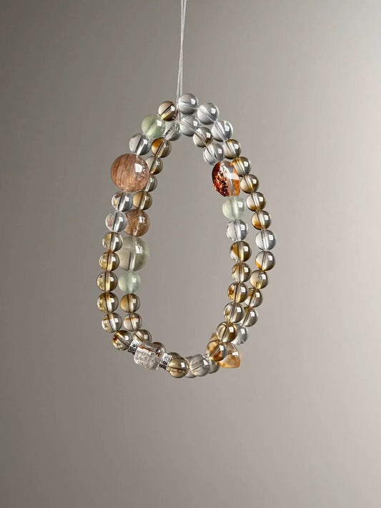 Hero view — multi-wrap bracelet featuring Citrine tower bead, Clear Quartz, rutilated cube accent, Prehnite and Orange Phantom, approx. 12–6.5 mm.