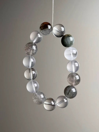 Full bracelet circle emphasizing clean drill lines, luminous selenite-like milkiness and speckled phantom quartz