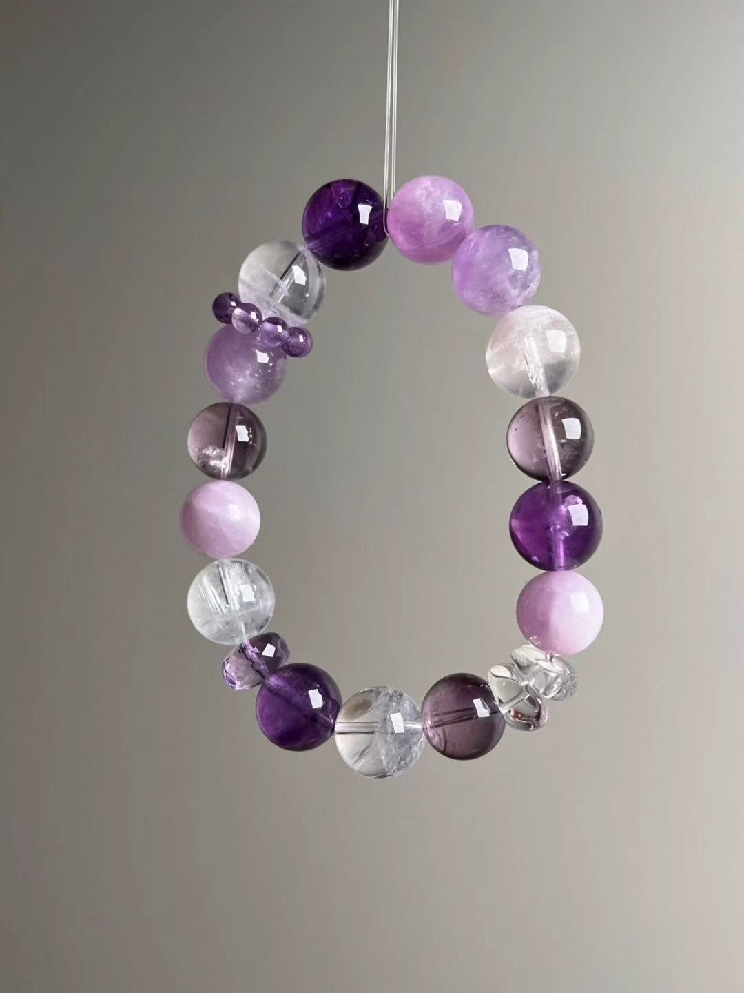 Angled hero—mixed light and deep purple beads, White Phantom and Clear Quartz accents, 12.5–11.5 mm