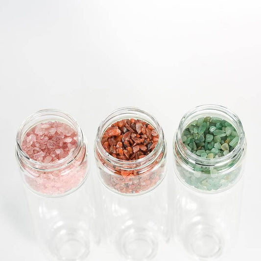 Top view of removable gem chambers filled with rose quartz, carnelian and green aventurine chips.