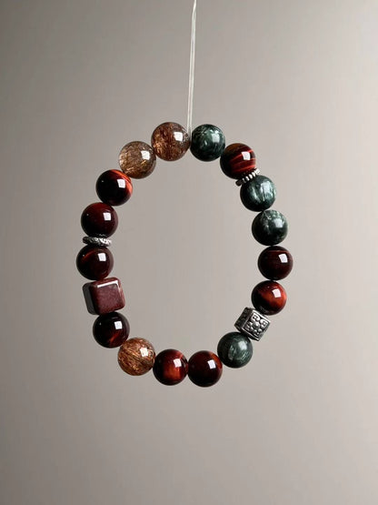 Opposite loop view with square red accent bead, silver spacers and seraphinite’s silver-green sheen.