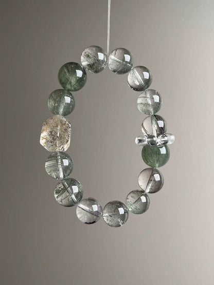 Angled hero—yellow-green phantom focal with clear-quartz bead-cluster spacer