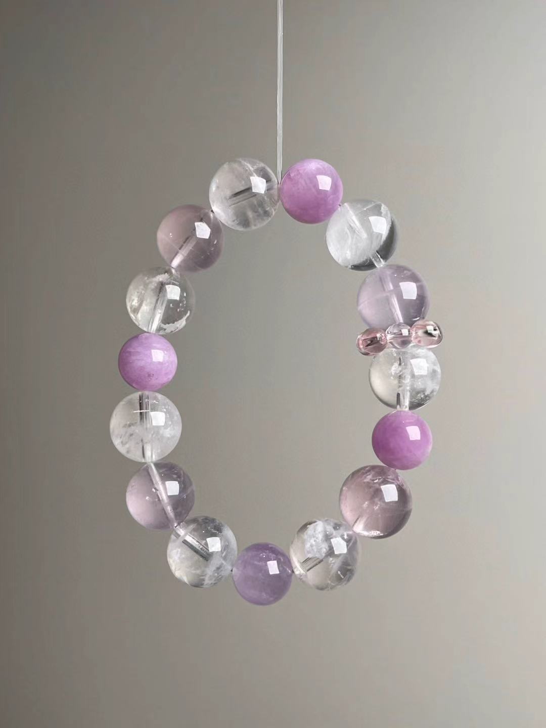Second angled view—mixed 14–11 mm beads with Lepidolite accents and White Phantom clarity