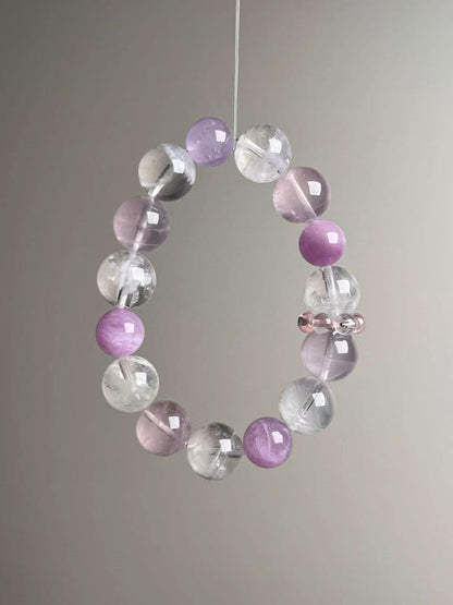 Macro texture—polished Rose Quartz, White Phantom Quartz and Lepidolite beads, 14–11 mm