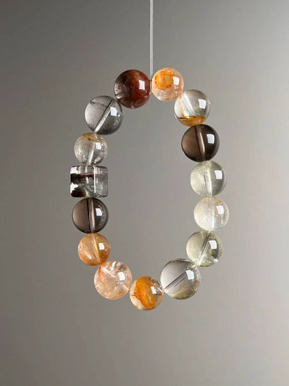 Angled hero—yellow Azeztulite glow and rounded Smoky Quartz with yellow bead-cluster spacer