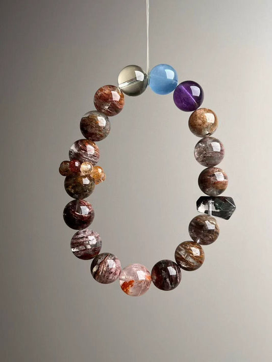 Seven-Spectrum Phantom Quartz bracelet upright view—layered phantom, amethyst, aquamarine, citrine
